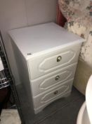 A pair of good white 3 drawer chest of drawes