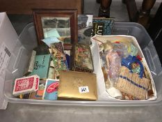 A very good box of dolls, tins, dominoes etc