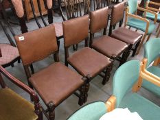 A set of 4 leather dining chairs