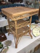 A cane 3 tier side table