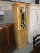 A Victorian pine astragal glazed cabinet