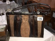 A crocodile skin handbag