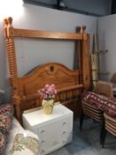 A large pine 4 poster bed (no bolts)