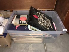 A box of LPs and 45 rpm singles