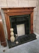Stained antique pine fire surround with tiled fire insert