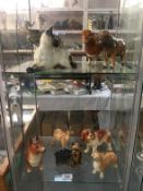 A quantity of figurines including Beswick Siamese cat, Royal Dux elephant, 3 Beswick A/F