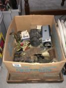 A box of misc items including Shell sconces, piano tray etc