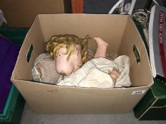 A box of old dolls including German porcelain
