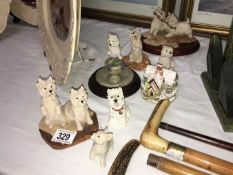 A quantity of West Highland Terrier dog ornaments