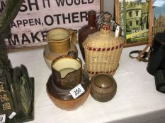 A quantity of stoneware bottles