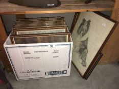 A box of framed and glazed pictures