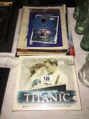 A quantity of Titanic film related items including stamps,