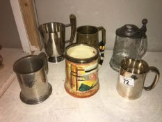 A silber plated tankard and 5 others