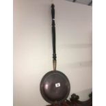 A copper warming pan