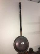 A copper warming pan