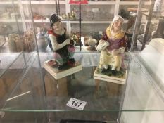 A pair of 19th c Staffordshire figure Cobbler Johnson and wife Nell