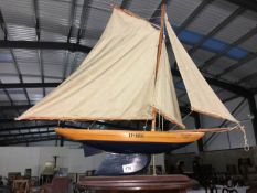 A wooden sailing yacht named Kerry Rose