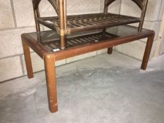 A glass topped wooden table