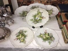 A quantity of fruit decorated plates etc