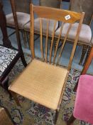 A light mahogany stick back chair