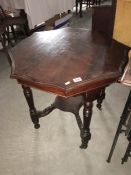 An Edwardian mahogany side table