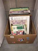 A box of LPs and singles