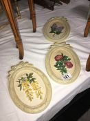 3 ornamental wall plaques of flowers