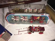 A boxed Corgi Jubilee coach and others