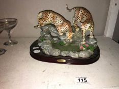 A Juliana leopard figural group