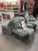 A green five piece suite consisting a three seater and 4 arm chairs