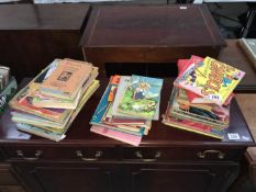 A quantity of children's books including annuals and Ladybird etc