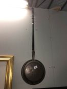 A copper warming pan