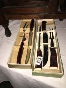 2 boxed carving sets