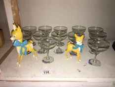 2 Babycham figures and 12 glasses