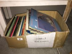 A quantity of LP records including Dire Straits,