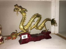 A gilded metal Chinese dragon