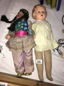 2 vintage dolls with plastic heads