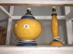 2 brightly coloured lamp bases