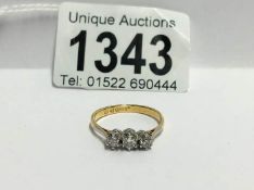 A 9ct 3 stone diamond ring,