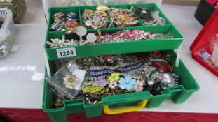 A large box of assorted costume jewellery