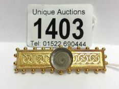 An antique 15ct gold locket back sweetheart brooch,