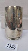 A silver tankard marked G.M.J.