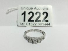 A 3 stone yellow gold diamond ring diamond shanked,