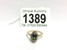 A marquasite shape diamond ring set with green stone in 18ct gold, dated London 1907,