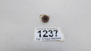 A 9ct gold garnet ring,