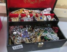 A jewellery box and assorted costume jewellery