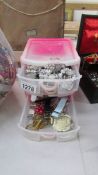 A small 3 drawer chest of assorted costume jewellery