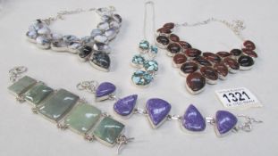 5 items of silver jewellery including necklaces,