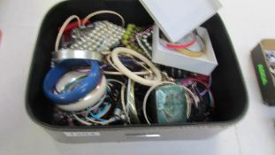 A case of assorted bangles etc
