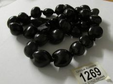 A large string of black beads
